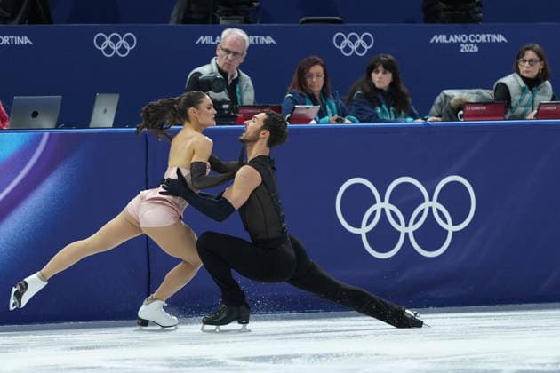 February 9, 2026, Milan, ITALY: Laurence Fournier Beaudry and Guillaume Cizeron of Team France compete in the Figure skating, Eiskunstlauf Ice Dance Rhythm Dance event during the 2026 Milan Cortina Winter Olympics in Milan, Italy on Monday, February 9, 2026. Canada News - February 9, 2026  - ZUMAc35_ 20260209_zaf_c35_141 Copyright: xNathanxDenettex