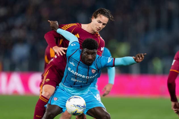 AS Roma v Cagliari Calcio - Serie A Enilive Daniele Ghilardi of AS Roma and Michel Ndary Adopo of Cagliari Calcio compete for the ball during the serie Serie A Enilive match between AS Roma and Cagliari Calcio at Stadio Olimpico on Febraury 9, 2026 in Rome, Italy Roma Stadio Olimpico Lazio Italy Copyright: xGiuseppexMaffiax SerieA_Roma-Cagliari_0902202609596