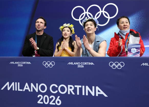 (260209) -- MILAN, Feb. 9, 2026 -- Wang Shiyue (2nd L) Liu Xinyu (2nd R) of China wait for their score during the rhythm dance of Figure skating, Eiskunstlauf ice dance competition at the Milan-Cortina 2026 Olympic Winter games, Winterspiele,Spiele, Summer games in Milan, Italy, Feb. 9, 2026. ) (MICO2026)ITALY-MILAN-OLYMPIC WINTER GAMES-FIGURE SKATING-ICE DANCE-RHYTHM DANCE ChenxYichen 