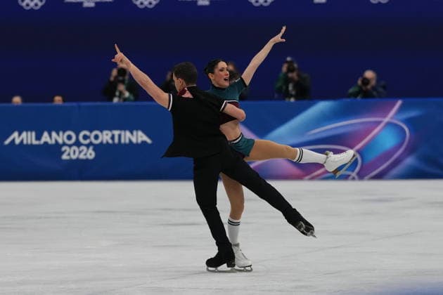 Italian s Charlene Guignard and Marco Fabbri compete during the rhythm dance in Figure skating, Eiskunstlauf at the 2026 Winter Olympics, in Milan, Italy, Monday, Feb. 9, 2026. (Claudio Furlan LaPresse )  Copyright: xClaudioxFurlanx xLaPressex
