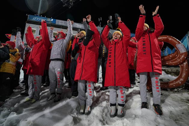 Milano Cortina 2026 Winter Olympics VAL DI FIEMME, ITALY - FEBRUARY 9: Spectators are cheering for German athlete Philipp Raimund, who won the gold medal, after men s Ski jumping, Skispringen, Ski, nordisch competition on day three of the Milano Cortina 2026 Winter Olympic Games, Olympische Spiele, Olympia, OS at Predazzo Ski Jumping Stadium in Val di Fiemme, Italy on February 9, 2026. Cemal Yurttas Anadolu Val di Fiemme Italy. Editorial use only. Please get in touch for any other usage.  Copyright: x2026xAnadoluxCemalxYurttasx