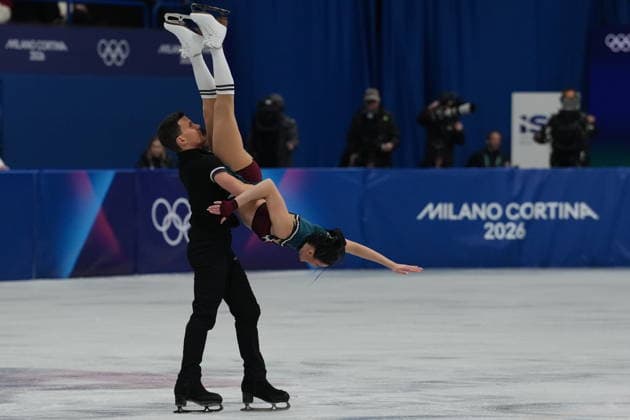 Italian s Charlene Guignard and Marco Fabbri compete during the rhythm dance in Figure skating, Eiskunstlauf at the 2026 Winter Olympics, in Milan, Italy, Monday, Feb. 9, 2026. (Claudio Furlan LaPresse )  Copyright: xClaudioxFurlanx xLaPressex