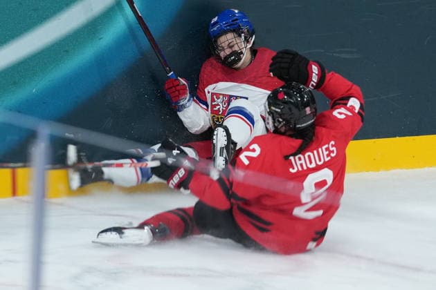 February 9, 2026, Milan, ITALY: CzechiaöÄÃ s Barbora Jurickova (20) and CanadaöÄÃ s Sophie Jaques (2) crash into the boards during the second period of a preliminary round women s hockey game at the Milan Cortina Winter Olympics, in Milan, on Monday, February 9, 2026. Canada News - February 9, 2026  - ZUMAc35_ 20260209_zaf_c35_181 Copyright: xDarrylxDyckx