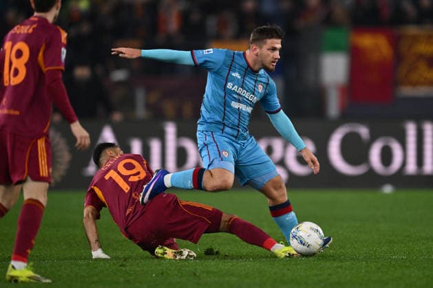 Zeki Celik of A.S. Roma and Semih Kilicsoy of Cagliari Calcio are in action during the 24th day of the Serie A Championship between A.S. Roma and Cagliari Calcio at the Olympic Stadium on February 9, 2026 in Rome, Italy.  Copyright: xDomenicoxCippitelli IPAxSportx xipa-agency.netx xx IPA_71200241 IPA_Agency_IPA71200241