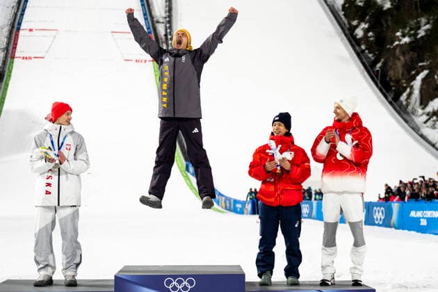 Ski jumping, Skispringen, Ski, nordisch - Milano Cortina 2026 Winter Olympics Day 3 (From L) Silver medallist Poland s Kacper Tomasiak, gold medallist Germany s Philipp Raimund and Bronze medallists who tied for third place Japan s Ren Nikaido and Switzerland s Gregor Deschwanden celebrate on the podium for the men s ski jumping normal hill individual final round of the Milano Cortina 2026 Winter Olympic Games, Olympische Spiele, Olympia, OS at Predazzo Ski Jumping Stadium in Predazzo (Val di Fiemme), on February 9, 2026. Predazzo Italy  Copyright: xAndrzejxIwanczukx originalFilename:iwanczuk-skijumpi260210_npcAb.jpg