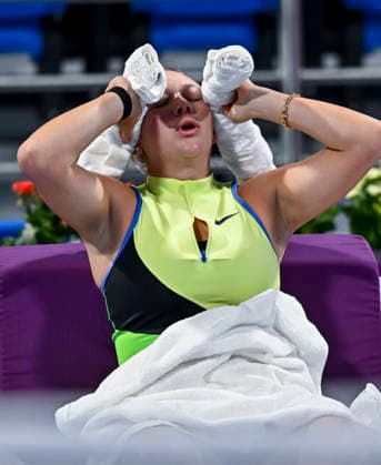 February 9, 2026, Doha, Qatar: Amanda Anisimova of the United States reacts during her round of 32 match against Karolina Pliskova of the Czech Republic (not pictured) at the WTA, Tennis Damen Qatar TotalEnergies Open 2026 tennis tournament at the Khalifa International Tennis Complex. Karolina Pliskova won the match after Amanda Anisimova retired, with the score 7-5, 6-7, 4-1. Doha Qatar - ZUMAs197 20260209_aaa_s197_202 Copyright: xNoushadxVariyattiyakkalx
