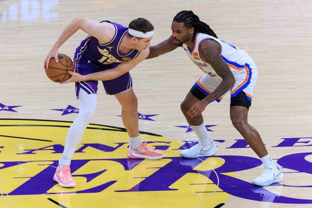 February 9, 2026, Los Angeles, California, USA: Cason Wallace 22 of the Oklahoma City Thunder guards Austin Reaves 15 of the Los Angeles Lakers during their regular season NBA, Basketball Herren, USA game on Monday February 9, 2026 at Crypto.com Arena in Los Angeles, California. ARIANA RUIZ PI Lakers Vs. Thunder  - ZUMAp124 20260209_zaa_p124_004 Copyright: xArianaxRuizx