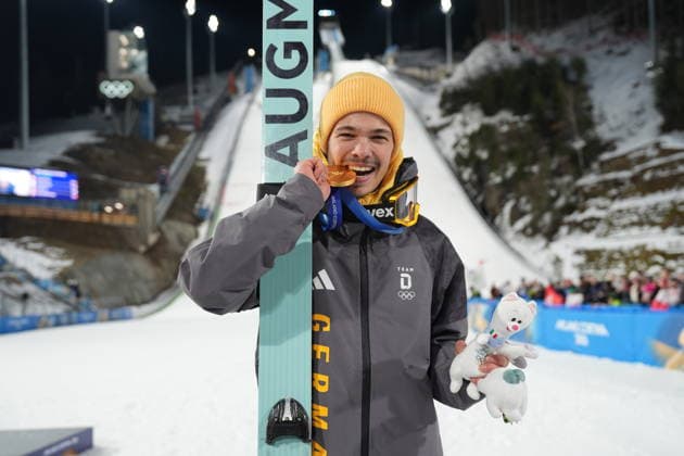 9th February 2026; Predazzo, Italy, 2026 Milano Cortina 2026 Winter Olympics Games, Day Four; Ski jumping, Skispringen, Ski, nordisch men& x2019;s normal hill; Philipp Raimund of Germany celebrates his gold medal  PaoloxNucci