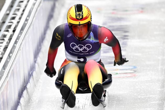 260209 -- CORTINA D AMPEZZO, Feb. 9, 2026 -- Merle Malou Fraebel of Germany competes during the luge women s singles run 1 at the Milan-Cortina 2026 Olympic Winter games, Winterspiele,Spiele, Summer games in Cortina, Italy, Feb. 9, 2026. MICO2026ITALY-CORTINA D AMPEZZO-OLYMPIC WINTER GAMES-LUGE-WOMEN S SINGLES LianxYi  (MICO2026)ITALY-CORTINA D AMPEZZO-OLYMPIC WINTER GAMES-LUGE-WOMEN S SINGLES IMAGO LianxYi  imago images 0847200582