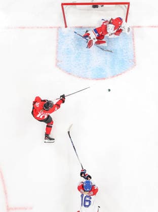 (260210) -- MILAN, Feb. 10, 2026 -- Sarah Fillier(L) of Canada shoots during the Ice hockey, Eishockey women s preliminary round group A match between Canada and the Czech Republic at the Milan-Cortina 2026 Olympic Winter games, Winterspiele,Spiele, Summer games in Milan, Italy, Feb. 9, 2026. ) (MICO2026) ITALY-MILAN-OLYMPIC WINTER GAMES-ICE HOCKEY-WOMEN-PRELIMINARY-CAN VS CZE SunxFei 