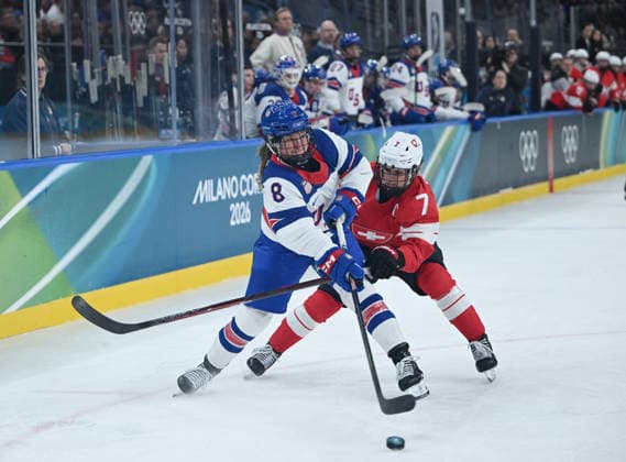 (260210) -- MILAN, Feb. 10, 2026 -- Haley Winn (L) of the United States vies with Lara Stalder of Switzerland during the Ice hockey, Eishockey women s preliminary round group A match between Switzerland and the United States at the Milan-Cortina 2026 Olympic Winter games, Winterspiele,Spiele, Summer games in Milan, Italy, Feb. 9, 2026. ) (MICO2026)ITALY-MILAN-OLYMPIC WINTER GAMES-ICE HOCKEY-WOMEN-PRELIMINARY-SUI VS USA ZhangxHaofu 