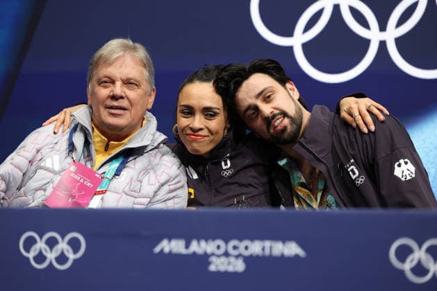 (260209) -- MILAN, Feb. 9, 2026 -- Jennifer Janse van Rensburg (C) Benjamin Steffan (R) of Germany attend the rhythm dance of Figure skating, Eiskunstlauf ice dance competition at the Milan-Cortina 2026 Olympic Winter games, Winterspiele,Spiele, Summer games in Milan, Italy, Feb. 9, 2026. ) (MICO2026)ITALY-MILAN-OLYMPIC WINTER GAMES-FIGURE SKATING-ICE DANCE-RHYTHM DANCE ChenxYichen 