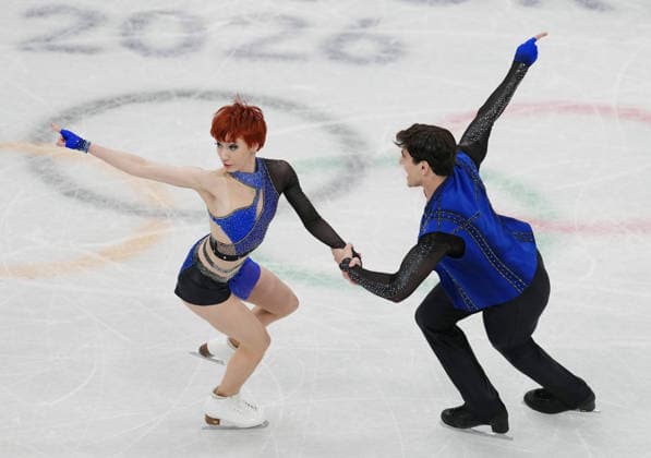 (260210) -- MILAN, Feb. 10, 2026 -- Evgeniia Lopareva (L) Geoffrey Brissaud of France perform during the rhythm dance of Figure skating, Eiskunstlauf ice dance competition at the Milan-Cortina 2026 Olympic Winter games, Winterspiele,Spiele, Summer games in Milan, Italy, Feb. 9, 2026. ) (MICO2026)ITALY-MILAN-OLYMPIC WINTER GAMES-FIGURE SKATING-ICE DANCE-RHYTHM DANCE XuexYuge 