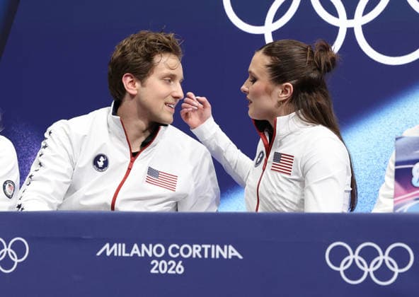 (260210) -- MILAN, Feb. 10, 2026 -- Christina Carreira (R) Anthony Ponomarenko of the United States react after performing during the rhythm dance of Figure skating, Eiskunstlauf ice dance competition at the Milan-Cortina 2026 Olympic Winter games, Winterspiele,Spiele, Summer games in Milan, Italy, Feb. 9, 2026. ) (MICO2026)ITALY-MILAN-OLYMPIC WINTER GAMES-FIGURE SKATING-ICE DANCE-RHYTHM DANCE ChenxYichen 