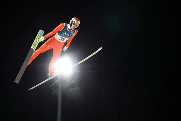 (260210) -- PREDAZZO, Feb. 10, 2026 -- Gregor Deschwanden of Switzerland competes during the Ski jumping, Skispringen, Ski, nordisch Men s Normal Hill Individual of the 2026 Milan-Cortina Winter Olympics in Predazzo, Italy, Feb. 9, 2026. ) (MICO2026)ITALY-MILAN-OLYMPIC Winter games, Winterspiele,Spiele, Summer games SKI JUMPING-MEN S NORMAL HILL INDIVIDUAL HuangxWei 