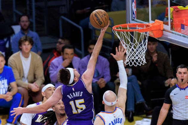 February 9, 2026, Los Angeles, California, USA: Austin Reaves 15 of the Los Angeles Lakers performs a layup as Alex Caruso 9 of the Oklahoma City Thunder defends the basket during their regular season NBA, Basketball Herren, USA game on Monday February 9, 2026 at Crypto.com Arena in Los Angeles, California. ARIANA RUIZ PI Lakers Vs. Thunder  - ZUMAp124 20260209_zaa_p124_018 Copyright: xArianaxRuizx