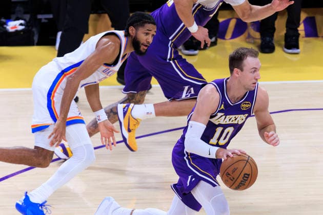 February 9, 2026, Los Angeles, California, USA: Luke Kennard 10 of the Los Angeles Lakers drives past Isaiah Joe 11 of the Oklahoma City Thunder during their regular season NBA, Basketball Herren, USA game on Monday February 9, 2026 at Crypto.com Arena in Los Angeles, California. ARIANA RUIZ PI Lakers Vs. Thunder  - ZUMAp124 20260209_zaa_p124_020 Copyright: xArianaxRuizx