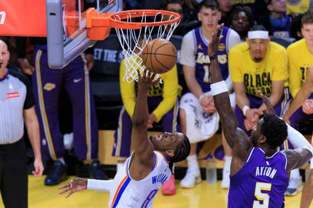 February 9, 2026, Los Angeles, California, USA: Jalen Williams 8 of the Oklahoma City Thunder performs a layup as Deandre Ayton 5 of the Los Angeles Lakers defends the basket during their regular season NBA, Basketball Herren, USA game on Monday February 9, 2026 at Crypto.com Arena in Los Angeles, California. Lakers lose to Thunder, 110-119. ARIANA RUIZ PI Lakers Vs. Thunder  - ZUMAp124 20260209_zaa_p124_022 Copyright: xArianaxRuizx
