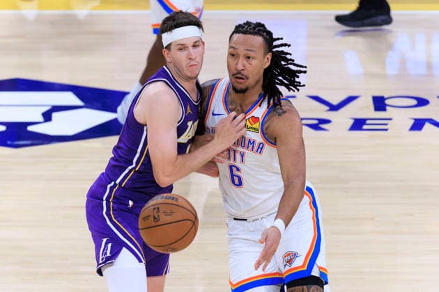 February 9, 2026, Los Angeles, California, USA: Austin Reaves 15 of the Los Angeles Lakers guards as Jaylin Williams 6 of the Oklahoma City Thunder passes the ball during their regular season NBA, Basketball Herren, USA game on Monday February 9, 2026 at Crypto.com Arena in Los Angeles, California. Lakers lose to Thunder, 110-119. ARIANA RUIZ PI Los Angeles USA - ZUMAp124 20260209_zaa_p124_031 Copyright: xArianaxRuizx
