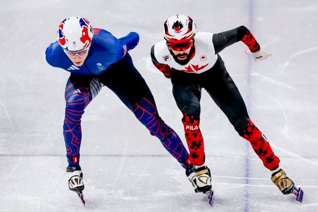 Niall Treacy of Great Britain and Steven Dubois of Canada Men s 1000m, Milano Cortina 2026 Winter Olympics: Day 4, Short Track Speed skating, Eisschnelllauf - Milano Cortina 2026 Winter Olympics: Day 4, Milano Speed Skating Stadium, February 10, 2026, Milan, Italy.