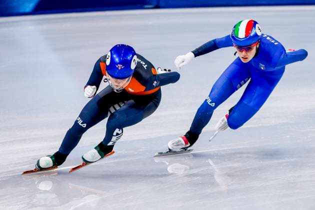 Xandra Velzeboer of the Netherlands and Elisa Confortola of Italy Mixed Team Relay Quarterfinals, Milano Cortina 2026 Winter Olympics: Day 4, Short Track Speed skating, Eisschnelllauf - Milano Cortina 2026 Winter Olympics: Day 4, Milano Speed Skating Stadium, February 10, 2026, Milan, Italy.