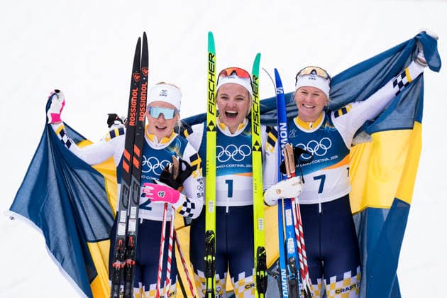 Winter Olympics in Milan Cortina 2026 Val di Fiemme, Italy 20260210. Jonna Sundling from Sweden, Linn Svahn from Sweden and Maja Dahlqvist from Sweden cheer during the cross-country sprint finals at Lago di Tesero during the Winter Olympics in Milano Cortina 2026. Photo: Terje Pedersen NTB Val di Fiemme Italy EDITORIAL USE ONLY. RESTRICTED USE FOR BETTING COMPANIES Ref:_SPObcKbrAzchjo.jpg *** Winter Olympics in Milan Cortina 2026 Val di Fiemme, Italy 20260210 Jonna Sundling from Sweden, Linn Svahn from Sweden and Maja Dahlqvist from Sweden cheer during the cross country sprint finals at Lago di Tesero during the Winter Olympics in Milano Cortina 2026 Photo Terje Pedersen NTB Val di Fiemme Italy EDITORIAL USE ONLY RESTRICTED USE FOR BETTING COMPANIES  Copyright: xTerjexPedersenx xNTBx