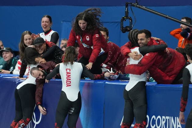 February 10, 2026, Milan, ITALY: Team Canada celebrates after winning a silver in the team mixed relay short track Speed skating, Eisschnelllauf at the 2026 Winter Olympics, in Milan, Italy, Tuesday, Feb. 10, 2026. Canada News - February 10, 2026  - ZUMAc35_ 20260210_zaf_c35_052 Copyright: xDarrylxDyckx
