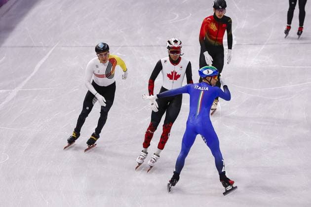 MILAN , 10-02-2026 , Milano Ice Skating Arena , season 2025 2026 , Olympic Winter games, Winterspiele,Spiele, Summer games 2026 - Short Track 10-02, Picture shows mixed relay Pietro Sighel finishes backwards and makes Italy Olympic champion Olympic Winter Games 2026 - Short Track 10-02  x201460895x Copyright: