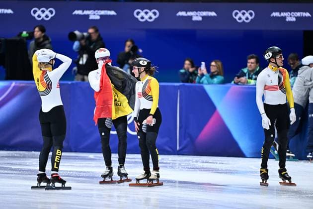 Belgian shorttrack skater Tineke den Dulk, Belgian shorttrack skater Ward Petre, Belgian shorttrack skater Hanne Desmet and Belgian shorttrack skater Stijn Desmet celebrate their bronze medal in the Final of the Mixed Team Relay of the Short Track Speed skating, Eisschnelllauf competition at the Milano Cortina 2026 Olympic Winter games, Winterspiele,Spiele, Summer games on Tuesday 10 February 2026 in Milan, Italy. The XXV Winter Olympics take place from 6 to 22 February 2026 in Italy. JASPERxJACOBS  x162384102x