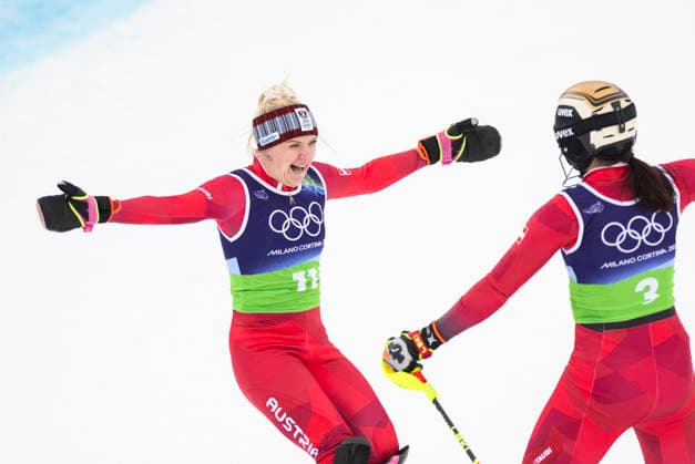 February 10, 2026, Cortina D ampezzo, Lombardy, Italy: After the slalom, Ariane Raedler, left, runs to hug teammate Katharina Huber of team Austria 2 celebrating their gold medal in the Womens Team Combined at Tofane Alpine Skiing Centre for the Milano Cortina 2026 Winter Olympics. Ariane Raedler skied the downhill portion. Cortina D ampezzo Italy - ZUMAsc5_ 20260210_oly_sc5_014 Copyright: xErichxSchlegelx