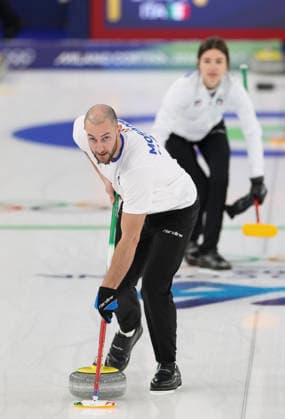 (260210) -- CORTINA D AMPEZZO, Feb. 10, 2026 -- Stefania Constantini Amos Mosaner (L) of Italy compete during the curling mixed doubles bronze medal match between Britain and Italy at the Milan-Cortina 2026 Olympic Winter games, Winterspiele,Spiele, Summer games in Cortina, Italy, Feb. 10, 2026. ) (MICO2026)ITALY-CORTINA D AMPEZZO-OLYMPIC WINTER GAMES-CURLING-MIXED DOUBLES-BRONZE MEDAL MATCH-GBR VS ITA DingxXu 
