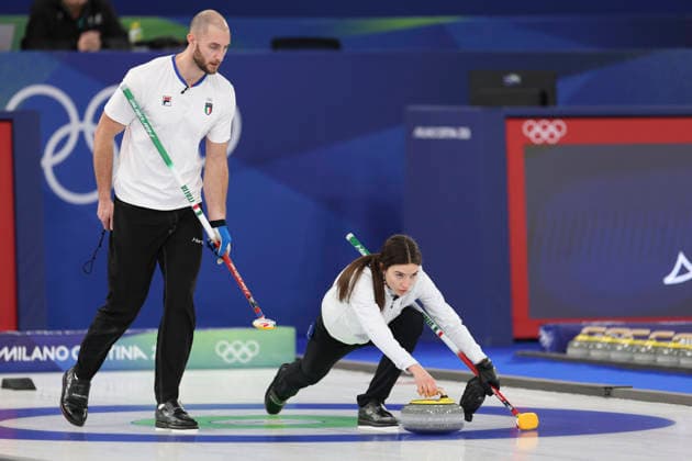 (260210) -- CORTINA D AMPEZZO, Feb. 10, 2026 -- Stefania Constantini (R) Amos Mosaner of Italy compete during the curling mixed doubles bronze medal match between Britain and Italy at the Milan-Cortina 2026 Olympic Winter games, Winterspiele,Spiele, Summer games in Cortina, Italy, Feb. 10, 2026. ) (MICO2026)ITALY-CORTINA D AMPEZZO-OLYMPIC WINTER GAMES-CURLING-MIXED DOUBLES-BRONZE MEDAL MATCH-GBR VS ITA DingxXu 
