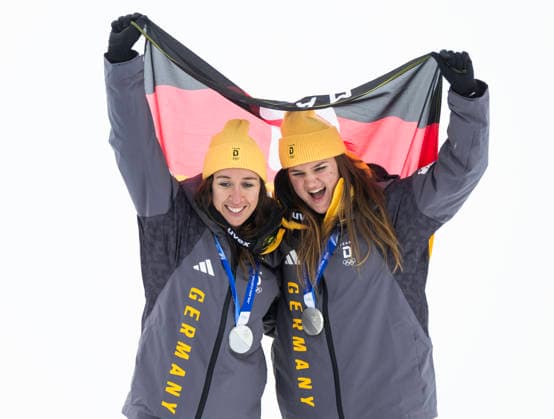 February 10, 2026, Cortina D ampezzo, Lombardy, Italy: Kira Weidle-Winkelmann and Emma Aicher of team Germany 2, left, won sliver in the Womens Team Combined at Tofane Alpine Skiing Centre for the Milano Cortina 2026 Winter Olympics. Cortina D ampezzo Italy - ZUMAsc5_ 20260210_oly_sc5_025 Copyright: xErichxSchlegelx