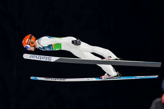 OLYMPICS - Winter Olympic Games, Olympische Spiele, Olympia, OS Milano Cortina 2026 PREDAZZO,ITALY,10.FEB.26 - OLYMPICS, Ski jumping, Skispringen, Ski, nordisch - Winter Olympic Games Milano Cortina 2026, normal hill, mixed team. Image shows Mihnea Alexandru Spulber (ROU).  GEPAxpictures xMatthiasxTrinkl