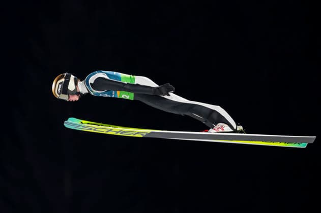 OLYMPICS - Winter Olympic Games, Olympische Spiele, Olympia, OS Milano Cortina 2026 PREDAZZO,ITALY,10.FEB.26 - OLYMPICS, Ski jumping, Skispringen, Ski, nordisch - Winter Olympic Games Milano Cortina 2026, normal hill, mixed team. Image shows Jason Colby (USA).  GEPAxpictures xMatthiasxTrinkl