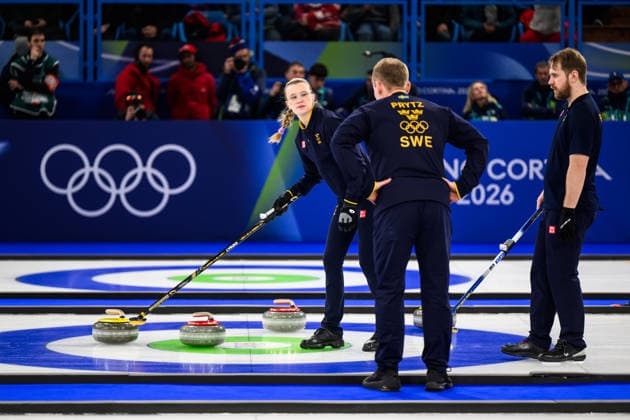 260210 Isabella Wrana, coach Andreas Prytz and Rasmus Wrana of Sweden compete in the mixed doubles curling final match between Sweden and USA during day 4 of the 2026 Winter Olympics on February 10, 2026 in Cortina. Photo: Jon Olav Nesvold BILDBYRAN COP 217 JM0787 bbeng curling Olympic Games, Olympische Spiele, Olympia, OS olympics winter olympics os ol olympiska spel vinter-os olympiske leker milano cortina 2026 milan cortina 2026 milano cortina 2026 olympic games milano cortina 2026 winter olympic games milano cortina-os milano cortina-ol vinter-ol final sverige sweden usa united states *** 260210 Isabella Wrana, coach Andreas Prytz and Rasmus Wrana of Sweden compete in the mixed doubles curling final match between Sweden and USA during day 4 of the 2026 Winter Olympics on February 10, 2026 in Cortina Photo Jon Olav Nesvold BILDBYRAN COP 217 JM0787 bbeng curling olympic games olympics winter olympics os ol olympiska spel vinter os olympiske leker milano cortina 2026 milan cortina 2026 milano cortina 2026 olympic games milano cortina 2026 winter olympic games milano cortina os milano cortina ol vinter ol final sverige sweden usa united states  Copyright: JONxOLAVxNESVOLD BB260210JE132