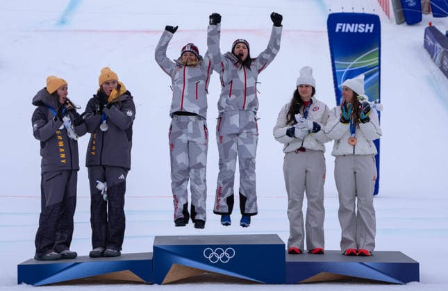 (260210) -- CORTINA D AMPEZZO, Feb. 10, 2026 -- Gold medalists Ariane Raedler (3rd L) and Katharina Huber (3rd R) of Austria, Silver medalists Kira Weidle-Winkelmann (1st L) and Emma Aicher (2nd L) of Germany and bronze medalists Jacqueline Wiles (2nd R) and Paula Moltzan of the United States attend the awarding ceremony of the alpine skiing women s team combined at the Milan-Cortina 2026 Olympic Winter games, Winterspiele,Spiele, Summer games in Cortina, Italy, Feb. 10, 2026. ) (MICO2026)ITALY-CORTINA D AMPEZZO-OLYMPIC WINTER GAMES-ALPINE SKIING-WOMEN S TEAM COMBINED FeixMaohua 