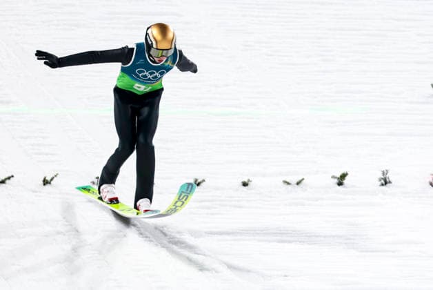 OLYMPICS - Winter Olympic Games, Olympische Spiele, Olympia, OS Milano Cortina 2026 PREDAZZO,ITALY,10.FEB.26 - OLYMPICS, Ski jumping, Skispringen, Ski, nordisch - Winter Olympic Games Milano Cortina 2026, normal hill, mixed team. Image shows Jason Colby (USA).  GEPAxpictures xMatthiasxTrinkl