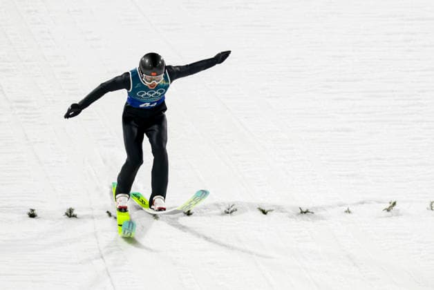 OLYMPICS - Winter Olympic Games, Olympische Spiele, Olympia, OS Milano Cortina 2026 PREDAZZO,ITALY,10.FEB.26 - OLYMPICS, Ski jumping, Skispringen, Ski, nordisch - Winter Olympic Games Milano Cortina 2026, normal hill, mixed team. Image shows Jiawen Zhao (CHN).  GEPAxpictures xMatthiasxTrinkl