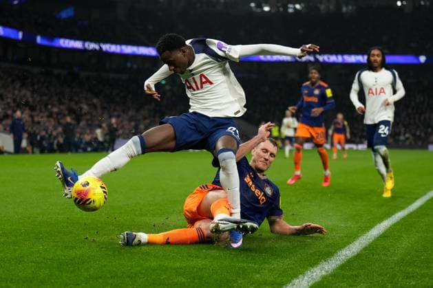 Dan Burn of Newcastle United tackles Pape Matar Sarr of Tottenham Hotspur Tottenham Hotspur v Newcastle United, Premier League, Football, Tottenham Hotspur Stadium, London, UK - 10 Feb 2026London Tottenham Hotspur Stadium United Kingdom EDITORIAL USE ONLY No use with unauthorised audio, video, data, fixture lists, club league logos or live services. Online in-match use limited to 120 images, no video emulation. No use in betting, games or single club league player publications. Copyright: xJoexToth Shutterstockx 16537168k