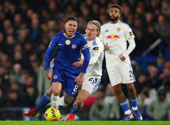 London, England, 10th February 2026. Enzo Fernandez of Chelsea tackled by Sebastiaan Bornauw of Leeds United during the Chelsea vs Leeds United Premier League match at Stamford Bridge, London. Picture credit should read: Paul Terry Sportimage EDITORIAL USE ONLY. No use with unauthorised audio, video, data, fixture lists, club league logos or live services. Online in-match use limited to 120 images, no video emulation. No use in betting, games or single club league player publications. SPI_024_PT_Chelsea_v_Leeds_United SPI-4517-0025