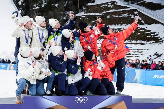 Winter Olympics in Milan Cortina 2026 Val di Fiemme, Italy 20260210. Gold medalists Nika Vodan, Anze Lanisek, Nika Prevc and Domen Prevc from Slovenia (center), silver medalists Anna Odine Strom, Kristoffer Eriksen Sundal, Eirin Maria Kvandal and Marius Lindvik from Norway (left) and bronze medalists Nozomi Maruyama, Ryoyu Kobayashi, Sara Takanashi and Ren Nikaido from Japan (right) during the medal ceremony for the mixed team competition in Ski jumping, Skispringen, Ski, nordisch in Predazzo during the Milan Cortina 2026 Winter Olympics. Photo: Terje Pedersen NTB Val di Fiemme Italy EDITORIAL USE ONLY. RESTRICTED USE FOR BETTING COMPANIES Ref:_SPOdy4NgCltExc.jpg *** Winter Olympics in Milan Cortina 2026 Val di Fiemme, Italy 20260210 Gold medalists Nika Vodan, Anze Lanisek, Nika Prevc and Domen Prevc from Slovenia center , silver medalists Anna Odine Strom, Kristoffer Eriksen Sundal, Eirin Maria Kvandal and Marius Lindvik from Norway left and bronze medalists Nozomi Maruyama, Ryoyu Kobayashi, Sara Takanashi and Ren Nikaido from Japan right during the medal ceremony for the mixed team competition in ski jumping in Predazzo during the Milan Cortina 2026 Winter Olympics Photo Terje Pedersen NTB Val di Fiemme Italy EDITORIAL USE ONLY RESTRICTED USE FOR BETTING COMPANIES  Copyright: xTerjexPedersenx xNTBx