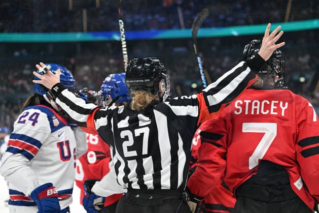 Refeere stops the fight during Ice hockey, Eishockey - CANADA vs USA, Olympic Winter games, Winterspiele,Spiele, Summer games Milano-Cortina 2026 in Milano, Italy, February 10 2026  Copyright: xFilippoxTomasi IPAxSportx xipa-agency.netx xx IPA_71238110 IPA_Agency_IPA71238110