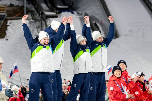 OLYMPICS - Winter Olympic Games, Olympische Spiele, Olympia, OS Milano Cortina 2026 PREDAZZO,ITALY,10.FEB.26 - OLYMPICS, Ski jumping, Skispringen, Ski, nordisch - Winter Olympic Games Milano Cortina 2026, normal hill, mixed team, medal ceremony. Image shows the rejoicing of Nika Vodan, Anze Lanisek, Nika Prevc and Domen Prevc (SLO).  GEPAxpictures xMatthiasxTrinkl