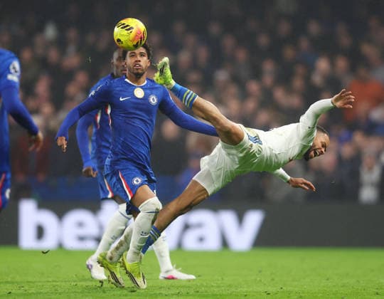 London, England, 10th February 2026. Andrey Santos of Chelsea tussles with Lukas Nmecha of Leeds United during the Chelsea vs Leeds United Premier League match at Stamford Bridge, London. Picture credit should read: Paul Terry Sportimage EDITORIAL USE ONLY. No use with unauthorised audio, video, data, fixture lists, club league logos or live services. Online in-match use limited to 120 images, no video emulation. No use in betting, games or single club league player publications. SPI_032_PT_Chelsea_v_Leeds_United SPI-4517-0033