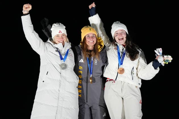 (260210) -- CORTINA D AMPEZZO, Feb. 10, 2026 -- Gold medalist Julia Taubitz (C) of Germany, silver medalist Elina Bota (L) of Latvia and Ashley Farquharson of the United States celebrate during the awarding ceremony of the luge women s singles at the Milan-Cortina 2026 Olympic Winter games, Winterspiele,Spiele, Summer games in Cortina, Italy, Feb. 10, 2026. ) (MICO2026)ITALY-CORTINA D AMPEZZO-OLYMPIC WINTER GAMES-LUGE-WOMEN S SINGLES LixGang 