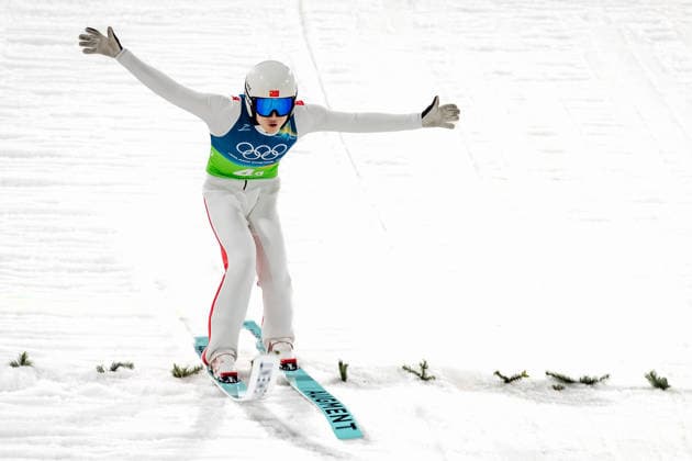 OLYMPICS - Winter Olympic Games, Olympische Spiele, Olympia, OS Milano Cortina 2026 PREDAZZO,ITALY,10.FEB.26 - OLYMPICS, Ski jumping, Skispringen, Ski, nordisch - Winter Olympic Games Milano Cortina 2026, normal hill, mixed team. Image shows Qiwu Song (CHN).  GEPAxpictures xMatthiasxTrinkl