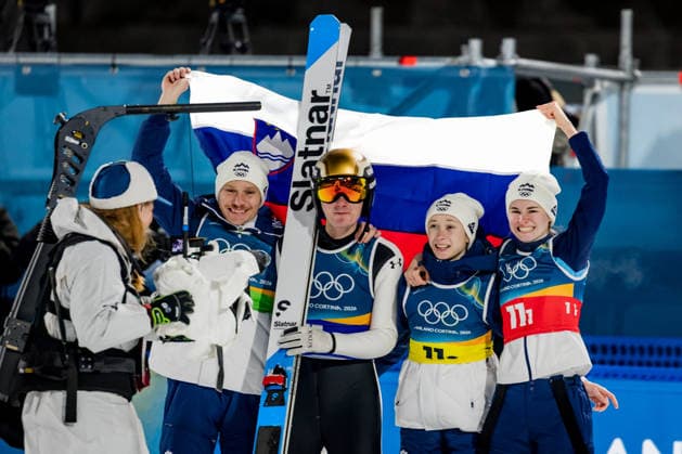 OLYMPICS - Winter Olympic Games, Olympische Spiele, Olympia, OS Milano Cortina 2026 PREDAZZO,ITALY,10.FEB.26 - OLYMPICS, Ski jumping, Skispringen, Ski, nordisch - Winter Olympic Games Milano Cortina 2026, normal hill, mixed team. Image shows Anze Lanisek, Domen Prevc, Nika Prevc and Nika Vodan (SLO).  GEPAxpictures xMatthiasxTrinkl