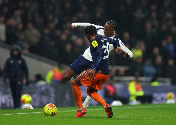 10th February 2026; Tottenham Hotspur Stadium, London, England; Premier League Football, Tottenham Hotspur versus Newcastle United; Mathys Tel of Tottenham Hotspur under pressure from Anthony Elanga of Newcastle United  JohnxPatrickxFletcher Content restricted for UK based newspaper