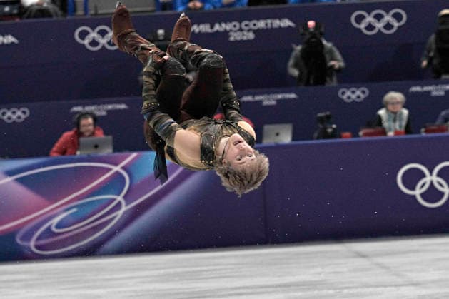 Ilia Malinin of United States performs a backflip during the Men s Single Short Program Figure skating, Eiskunstlauf competition at the Milano Figure Skating Arena in Milan, Italy on Tuesday, February 10, 2026. Malinin is in first place with a score of 108.16.  OLY20260210240 RichardxEllis